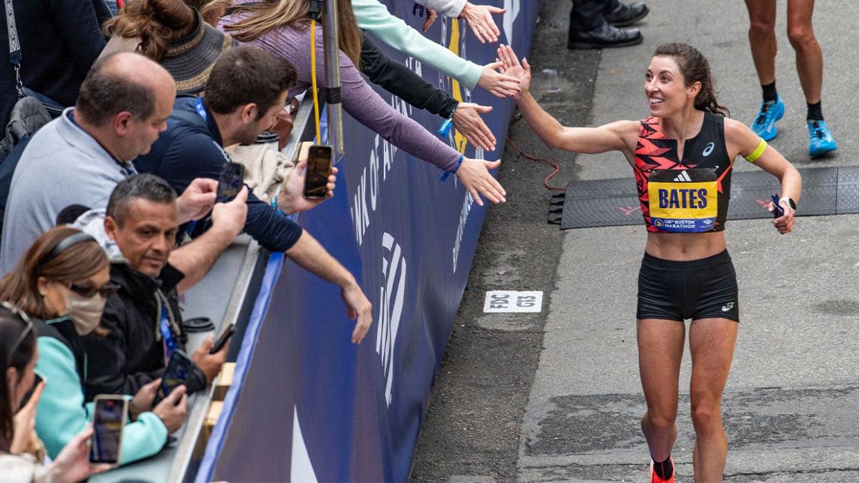 <div>US distance runner Emma Bates greets fans after crossing the finish line during the 128th Boston Marathon on April 15, 2024, in Boston, Massachusetts. The marathon includes around 30,000 athletes from 129 countries running the 26.2 miles from Hopkinton to Boston, Massachusetts. The event is the worlds oldest annually run marathon.</div> <strong>(Getty Images)</strong>