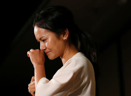 Former women's world number one golfer Ai Miyazato of Japan reacts as she attends a news conference to announce her retirement in Tokyo, Japan May 29, 2017. REUTERS/Issei Kato