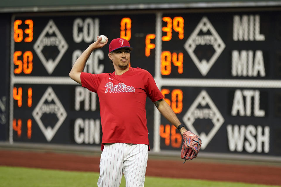 Philadelphia Phillies' Orion Kerkering warms up before a baseball game against the New York Mets, Friday, Sept. 22, 2023, in Philadelphia. (AP Photo/Matt Slocum)