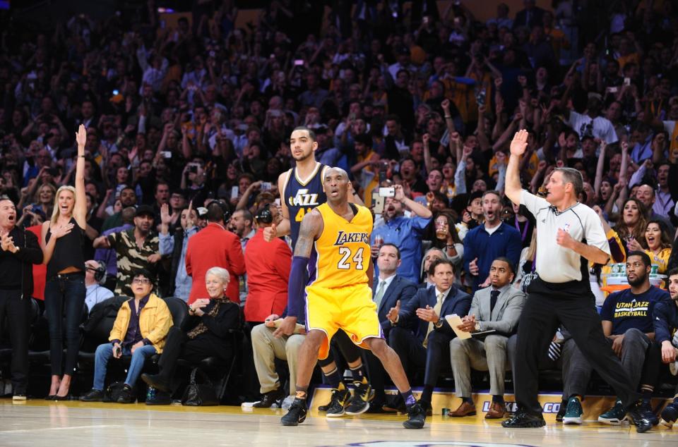 Kobe Bryant makes a three-pointer against the Jazz during the final game of his career.