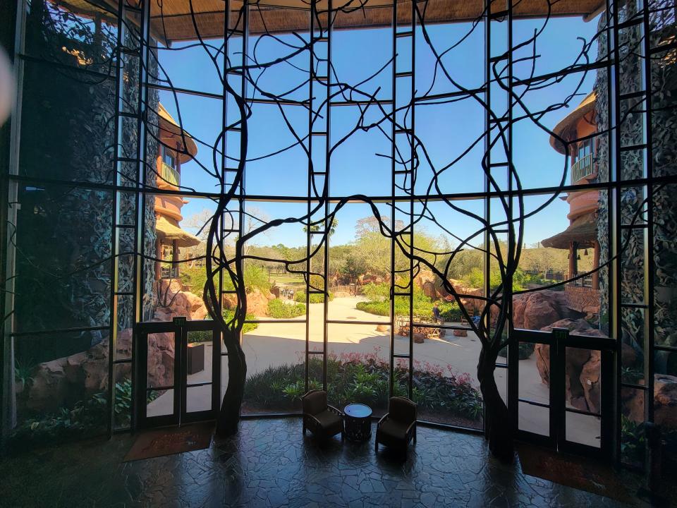 floor to ceiling window in the lobby of the jambo house at animal kingdom lodge