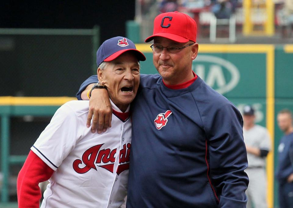 Cleveland manager Terry Francona, right, hugs his father Tito Francona prior to a game against the New York Yankees, Monday, April 8, 2013, in Cleveland.