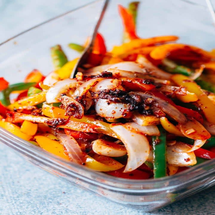 A close-up of a chicken fajita bowl.