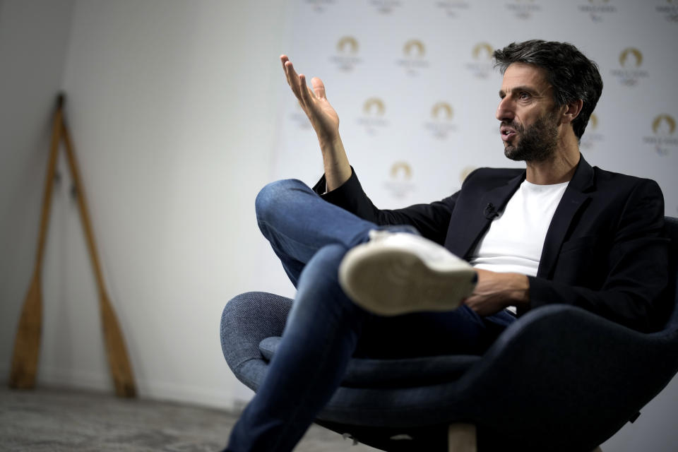 Paris 2024 Olympics Organizing Committee President Tony Estanguet gestures during an interview with the Associated Press at the headquarters of Paris 2024 in Saint-Denis, outside Paris, France, Tuesday, June 27, 2023. (AP Photo/Christophe Ena)