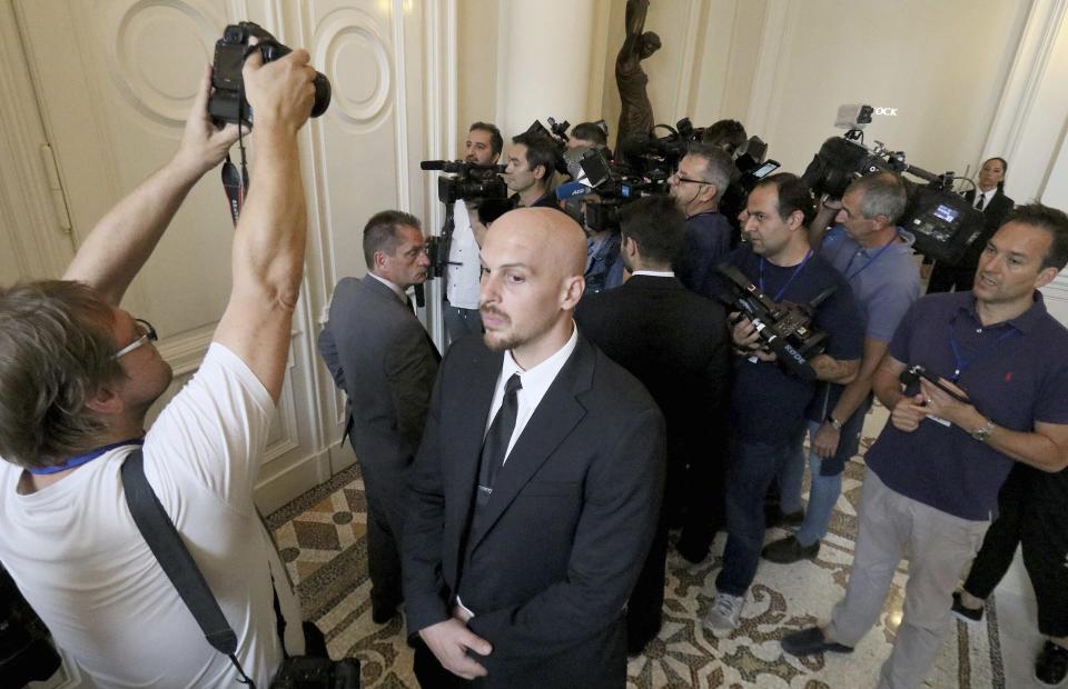 Journalists are waiting for a meeting with the European Union's political director Helga Schmid and Iran's deputy Foreign Minister Abbas Araghchi at a bilateral meeting as part of the closed-door nuclear talks with Iran at a hotel in Vienna, Austria, Sunday, July 28, 2019.