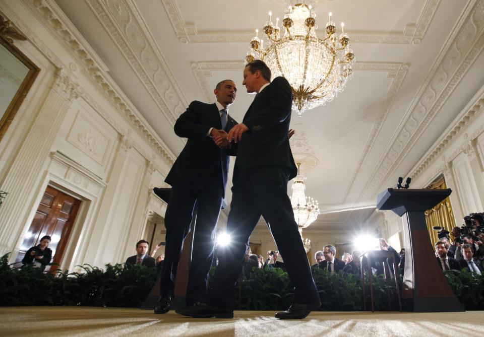 President Barack Obama greets British Prime Minister David Cameron following their joint news conference at the White House in Washington January 16, 2015. (Photo: Larry Downing/Reuters)