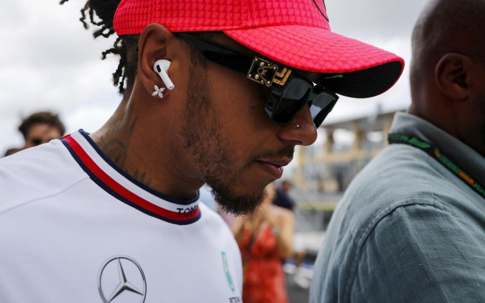 Driver Lewis Hamilton of Mercedes-AMG Petronas F1 Team is seen at the pit lane ahead of the F1 Grand Prix of Miami at the Miami International Autodrome on May 07, 2023 in Miami Gardens - Getty Images/Eva Marie Uzcategul