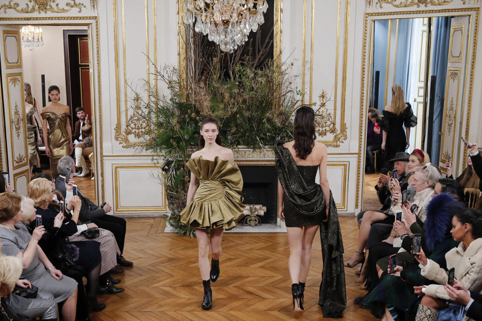 A model wears a creation for Valentin Yudashkin fashion collection during Women's fashion week Fall/Winter 2020/21 presented in Paris, Tuesday, March 3, 2020. (AP Photo/Francois Mori)