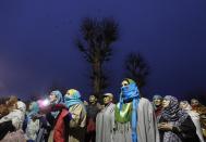 Kashmiri Muslims pray during the festival of Eid-e-Milad-ul-Nabi at Hazratbal shrine on a cold winter morning in Srinagar January 14, 2014. Thousands of Kashmiri Muslims on Tuesday thronged to the shrine of Hazratbal, which houses a relic believed to be a hair from the beard of Prophet Mohammad, to celebrate Eid-e-Milad-ul-Nabi, the Prophet's birth anniversary. REUTERS/Danish Ismail (INDIAN-ADMINISTERED KASHMIR - Tags: RELIGION SOCIETY ANNIVERSARY)