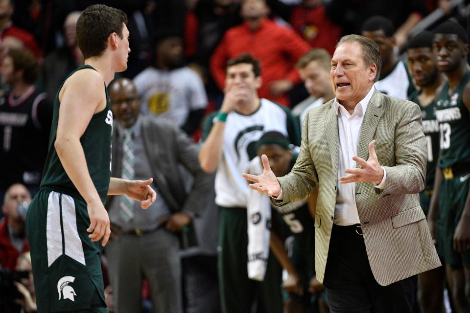 Nov 27, 2018; Louisville, KY, USA; Michigan State Spartans head coach Tom Izzo talks with guard Foster Loyer (3) during overtime against the Louisville Cardinals at KFC Yum! Center. Louisville defeated Michigan State 82-78.  Mandatory Credit: Jamie Rhodes-USA TODAY Sports