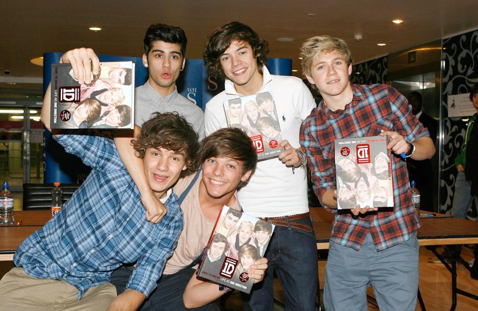 X Factor teen heartthrobs One Direction sign copies of their new book 'Dare To Dream' at Westfilesd's WH Smith, North West London (L-R) Liam Payne,Zayne Malik,Harry Styles,Niall Horan and centre Louis Tomlinson of One Direction