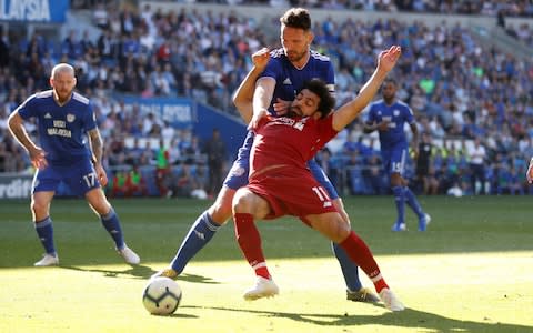 Cardiff City's Sean Morrison concedes a penalty against Liverpool's Mohamed Salah - Credit: REUTERS