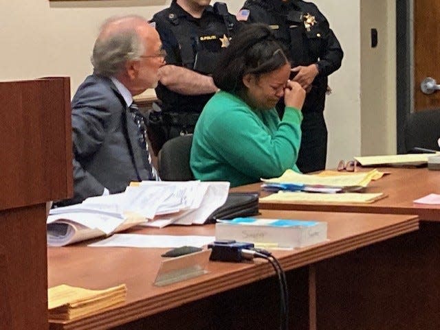 Yokauri Batista-Alcantara, seated next to her attorney Steven Altman, becomes emotional during her sentencing Wednesday before Middlesex County Superior Court Judge Benjamin Bucca