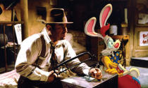 <p>Who Framed Roger Rabbit (1988). Based on Gary K. Wolf's novel 'Who Censored Roger Rabbit?' this film is a murder mystery set in 1947, in a surreal world where cartoon characters, commonly called "toons", are living beings and interact with humans. If you haven't seen it, this film is worth a watch!</p>