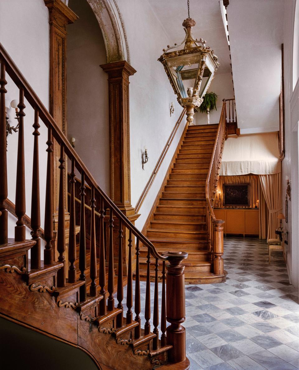 Two cypress staircases in the Peter & Paul schoolhouse lobby.