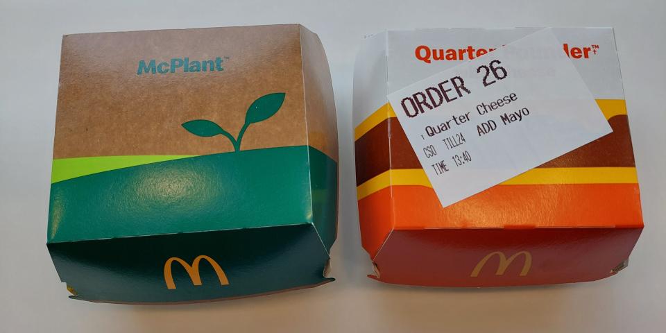 Photo of the packaging of a McPlant and a Quarter Pounder with Cheese from McDonald's, taken in July 2024