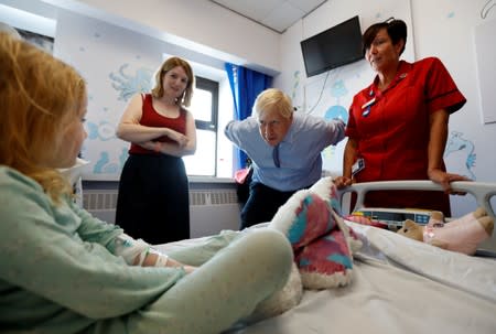 Britain's PM Johnson visits the Royal Cornwall Hospital in Truro