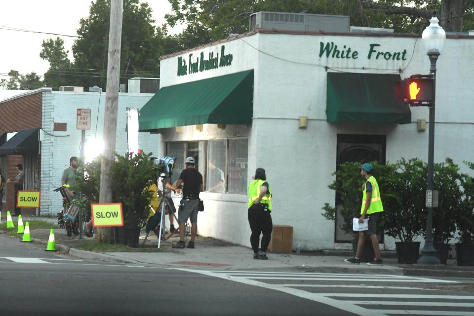 Members of the cast of crew of Hulu's "Reprisal" shoot a scene at White Front Breakfast House in Wilmington, N.C., Tuesday, Sept. 24, 2019.