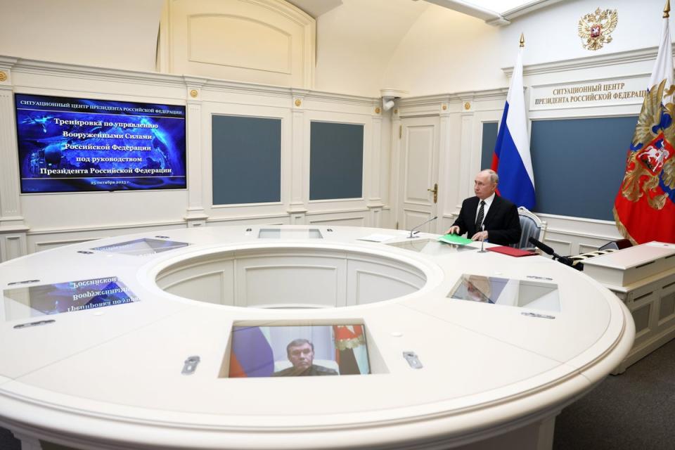 Russian president Vladimir Putin attends a training to test the strategic deterrence forces via a video link in Moscow (EPA)