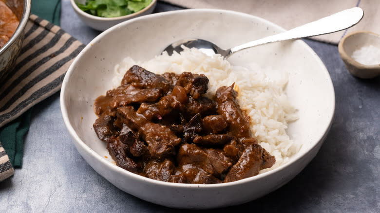 Beef stew served with rice