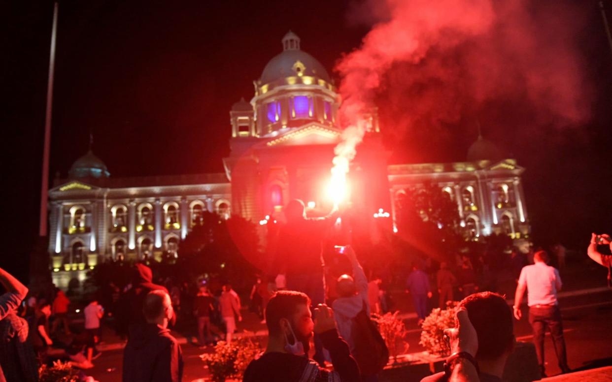 Protesters gather in front of the Serbian Parliament in Belgrade on Tuesday before violent clashes broke out with police. - ANDREJ CUKIC/EPA-EFE/Shutterstock/Shutterstock