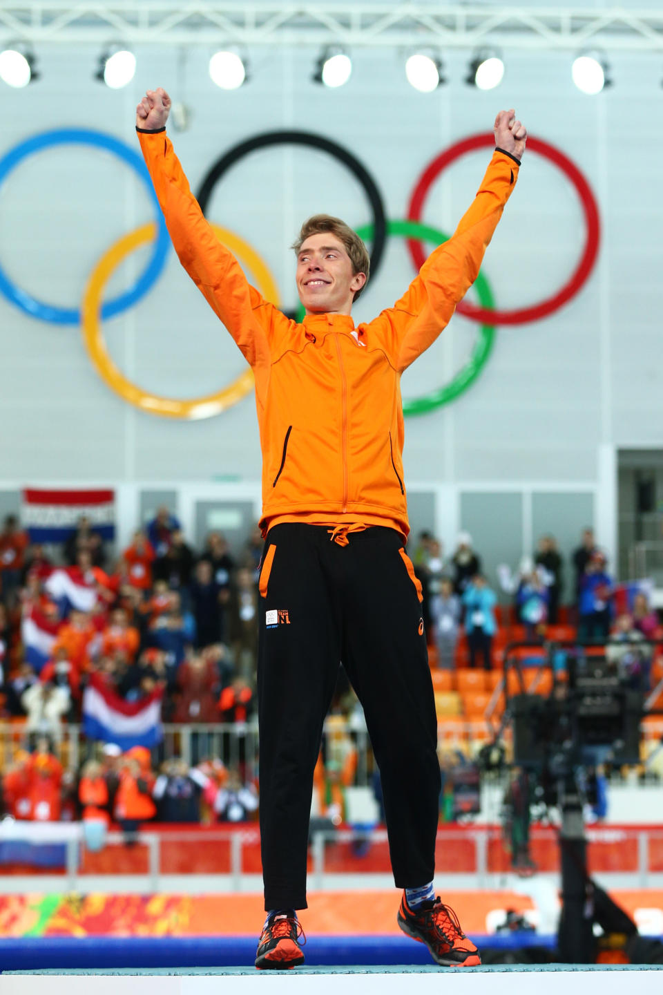 SOCHI, RUSSIA - FEBRUARY 18:  Gold medalist Jorrit Bergsma of the Netherlands celebrates during the flower ceremony for the Men's 10000m Speed Skating event on day eleven of the Sochi 2014 Winter Olympics at Adler Arena Skating Center on February 18, 2014 in Sochi, Russia.  (Photo by Quinn Rooney/Getty Images)
