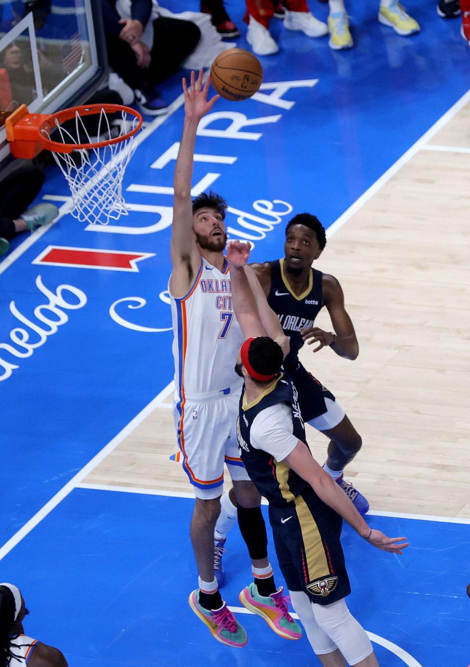 Oklahoma City Thunder forward Chet Holmgren (7) blocks the shot of New Orleans Pelicans forward Larry Nance Jr. (22) late in the fourth quarter during Game 1 of the NBA basketball playoff series between the Oklahoma City Thunder and the New Orlean Pelicans at Paycom Center in Oklahoma City, Sunday, April 21, 2024.