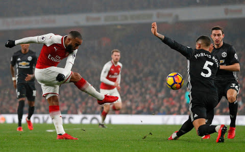 Lacazette shoots - Credit: AFP