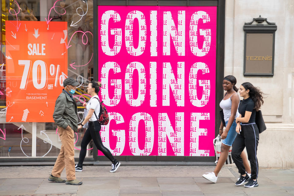 Discount signs in shops on Oxford Street, London. Picture date: Tuesday July 14, 2020. Photo credit should read: Matt Crossick/Empics