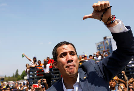 Venezuelan opposition leader Juan Guaido, who many nations have recognised as the country's rightful interim ruler, takes part in a rally against Venezuelan President Nicolas Maduro's government, in Guacara, Venezuela March 16, 2019. REUTERS/Carlos Jasso