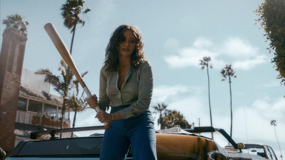 Sofía Vergara as Griselda holding a bat in Griselda