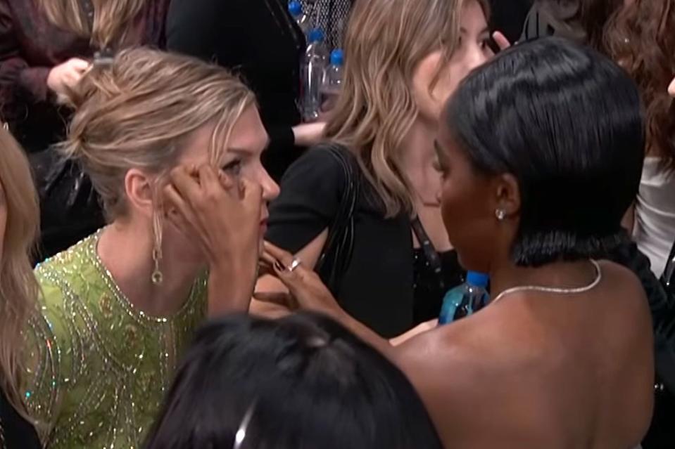 <p>E!</p> Ayo Edebiri helps Rhea Seehorn touch up her makeup on the 2023 Emmys red carpet.