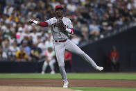 Arizona Diamondbacks shortstop Geraldo Perdomo throws to first to complete a double play after tagging out San Diego Padres' Ha-Seong Kim running to third on a ball hit by Austin Nola during the third inning of a baseball game Friday, July 15, 2022, in San Diego. (AP Photo/Derrick Tuskan)