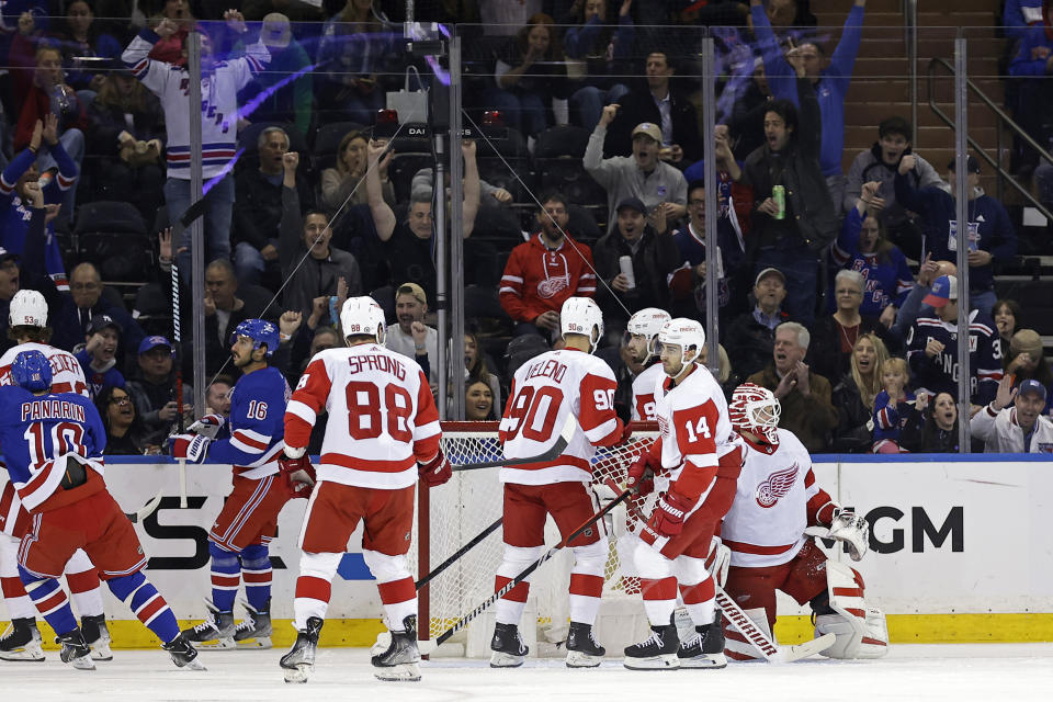 New York Rangers center Vincent Trocheck (16) reacts after scoring a goal past Detroit Red Wings goaltender Ville Husso, right, in the first period of an NHL hockey game Tuesday, Nov. 7, 2023, in New York. (AP Photo/Adam Hunger)