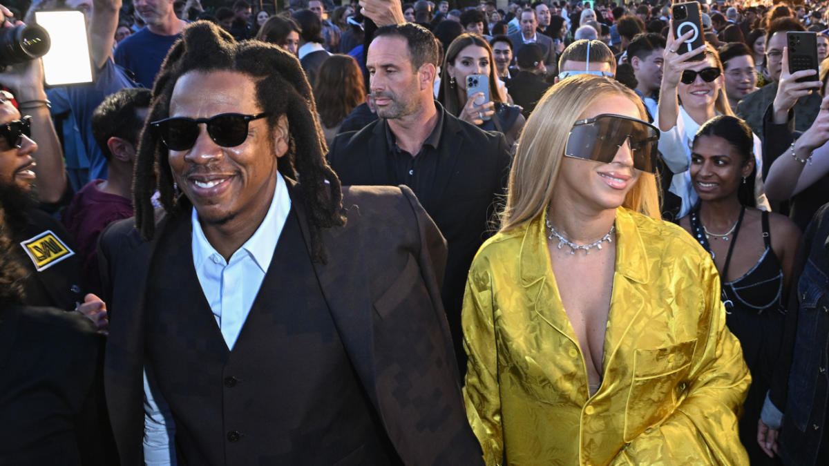 Beyoncé Is Giving Big Buzz Energy in Oversize Sunnies and a Yellow Satin  Set