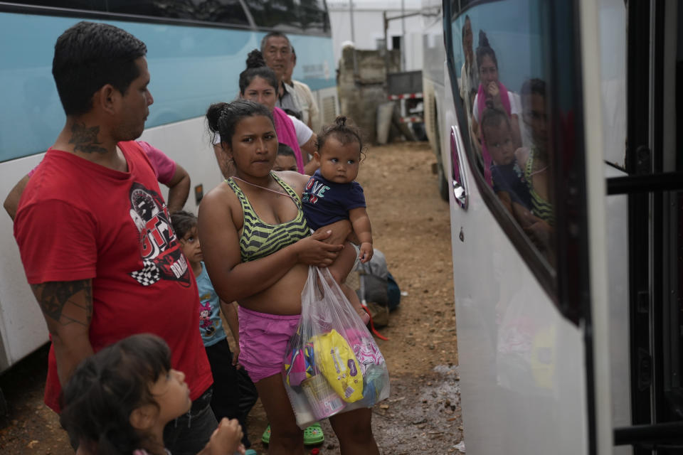 Migrants wait to board a bus to the Panamanian-Costa Rican border in a temporary camp after having crossed the Darien Gap from Colombia in Lajas Blancas, Panama, Thursday, June 27, 2024. (AP Photo/Matias Delacroix)