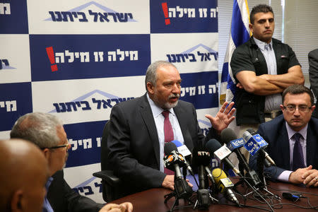 Avigdor Lieberman (C), head of far-right Yisrael Beitenu party, speaks during his party's meeting in the Knesset, the Israeli parliament, in Jerusalem May 23, 2016. REUTERS/Ronen Zvulun