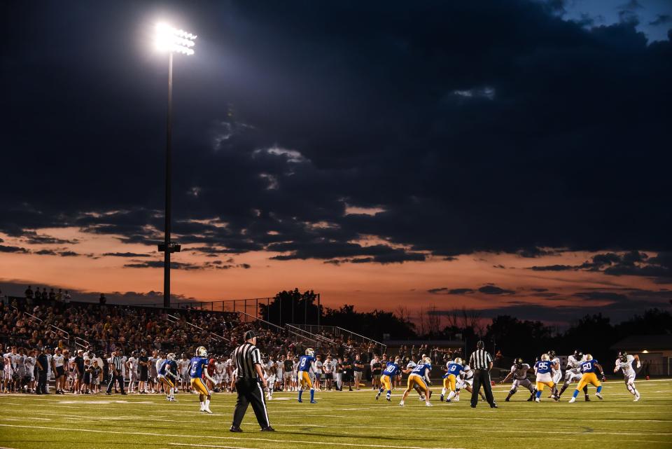 The sun sets on a football opener between Franklin and Catholic Memorial on Friday, August 19, 2022, at Franklin High School in Franklin, Wisconsin. Catholic Memorial won, 34-28.