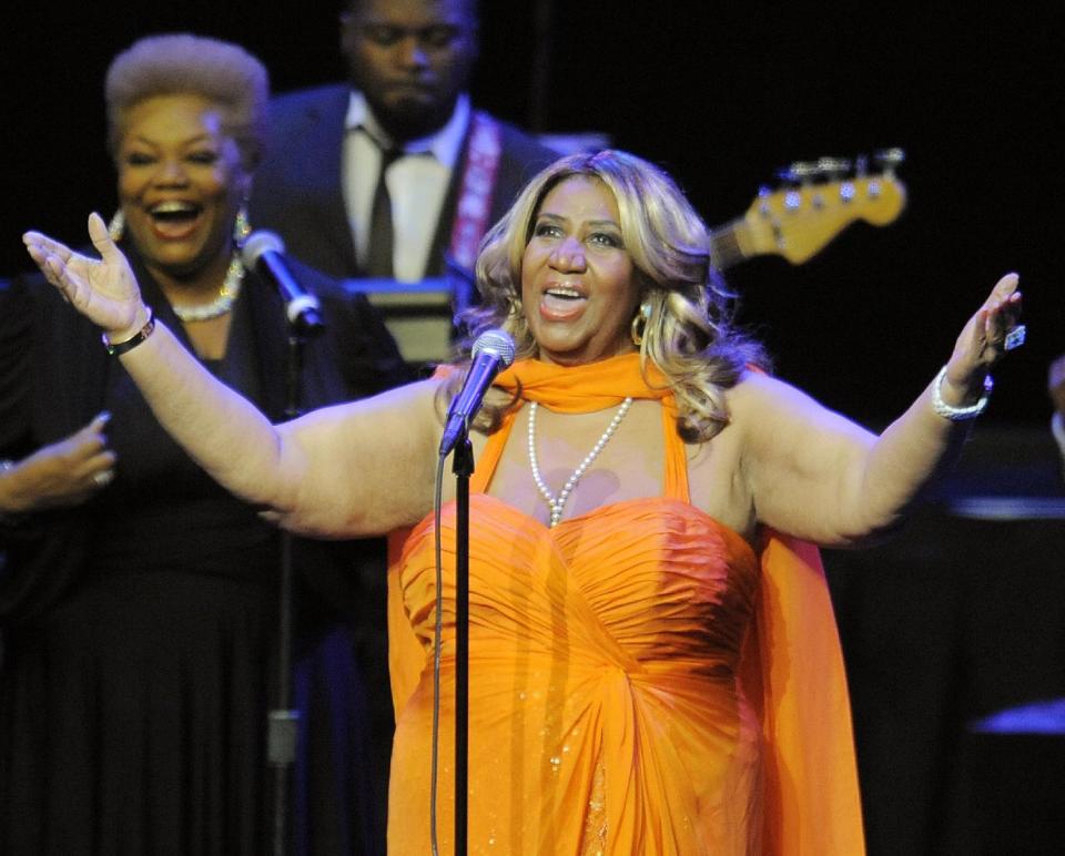 FILE - This July 25, 2012 file photo shows Aretha Franklin performing at the NOKIA Theatre L.A. LIVE in Los Angeles. Franklin will be headlining the annual McDonald's Gospelfest at the Prudential Center in Newark, N.J. on Saturday, May 11, 2013, but she's also preparing for something else big this weekend: a meeting about her upcoming biopic. The 71-year-old singer said in an interview Thursday, May 9, 2013, that she's holding a meeting to figure out the plans for the film, which has been in the works for years. (Photo by Chris Pizzello/Invision/AP, file)