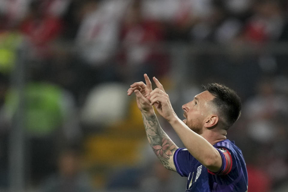 Argentina's Lionel Messi celebrates scoring his side's second goal against Peru during a qualifying soccer match for the FIFA World Cup 2026 at the National stadium in Lima, Peru,Tuesday, Oct. 17, 2023.(AP Photo/Martin Mejia)