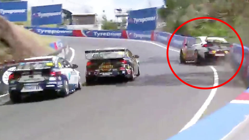 Jamie Whincup is pictured hitting the wall at the Cutting, ending his race at the Bathurst 1000.