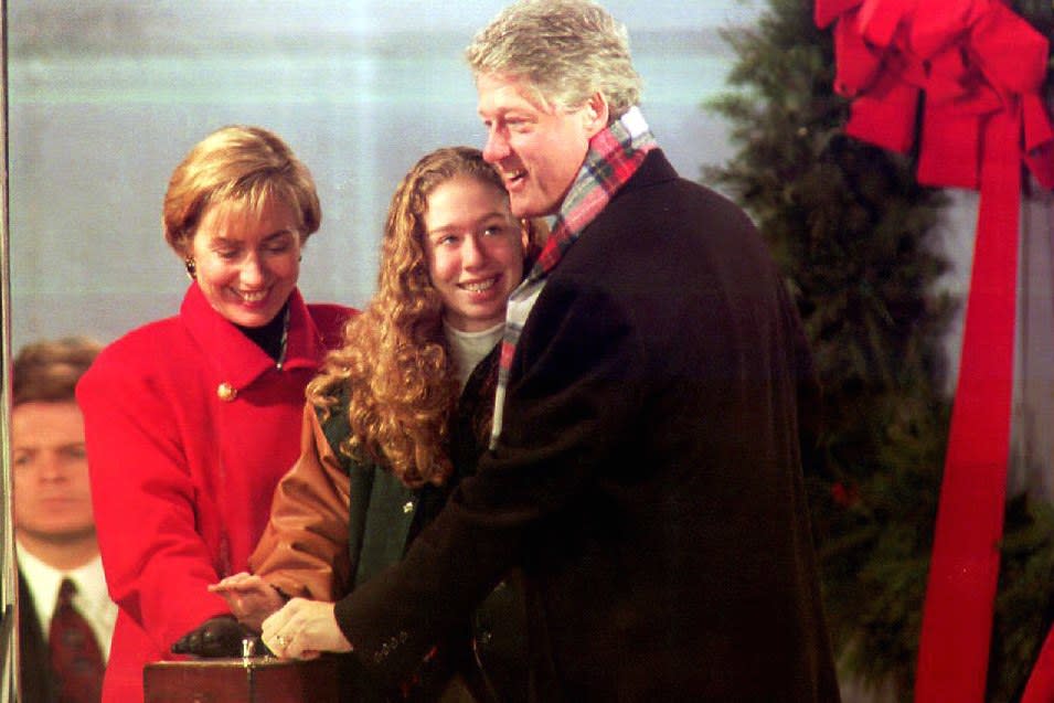 <strong>Hillary,</strong> <strong>Chelsea,</strong> and <strong>Bill Clinton</strong> light the White House Christmas tree, December 1993.