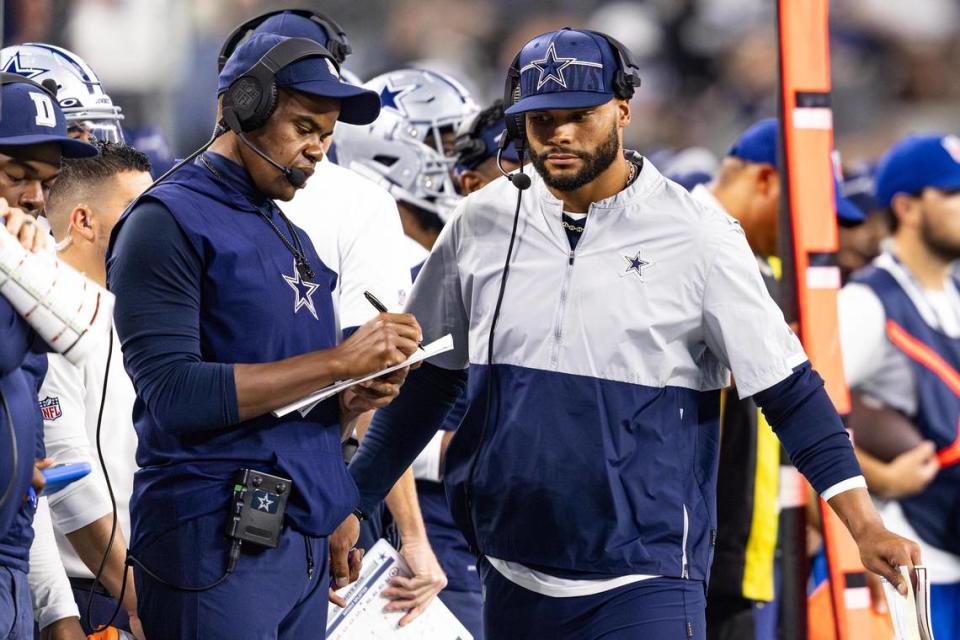 Dallas Cowboys quarterback Dan Prescott calls plays for the offense on the sidelines in the first half of a preseason game against the Las Vegas Raiders at AT&T Stadium in Arlington, Texas on Saturday, Aug. 26, 2023.