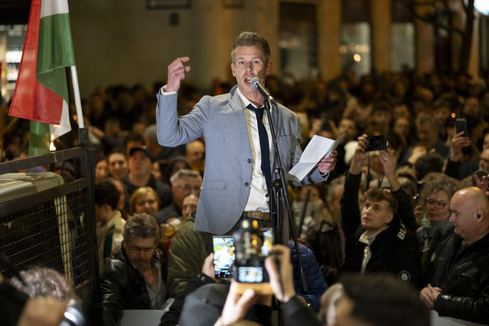 Former Hungarian government insider Peter Magyar gives a speech next tot Kossut Lajos Square on Tuesdy, in Budapest, Hungary, March 26, 2024. Magyar on Tuesday released a recording that he claims proves senior officials in the government of Prime Minister Viktor Orban manipulated court documents to cover up their involvement in a corruption case. (AP Photo/Denes Erdos)