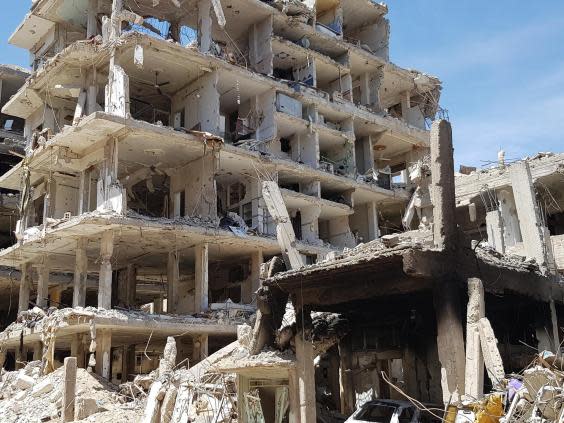 Bombed-out civilian apartments once lived in by Islamist rebels in Douma (Yara Ismail)