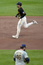 Pittsburgh Pirates' Bryan Reynolds (10) rounds the bases after hitting a two-run home run off starting pitcher Bryse Wilson (46) during the third inning of a baseball game in Pittsburgh, Wednesday, April 24, 2024. (AP Photo/Gene J. Puskar)