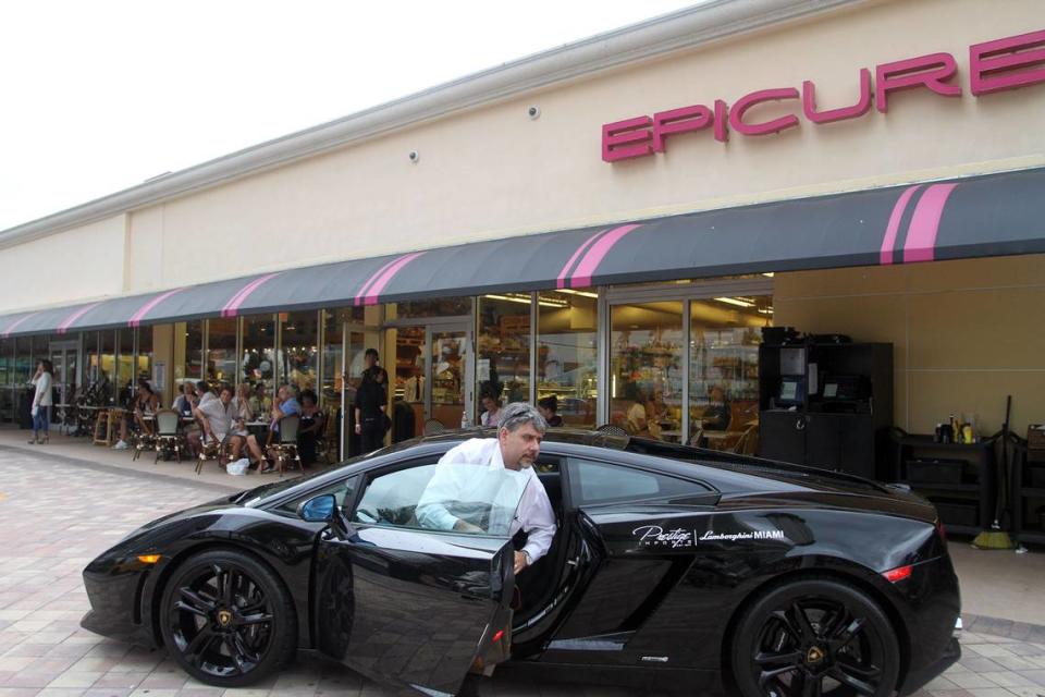 Dominick Raneri, finance director at Prestige Imports, parks an LP 560 Lamborghini at Epicure Sunny Isles Beach as Epicure and Prestige Imports host their monthly Lamborghini-tini event bringing Lamborghinis, cocktails and food all to one place at Epicure on Saturday, Sept. 3, 2011. The event took place the first Saturday of every month at Epicure in Sunny Isles Beach.