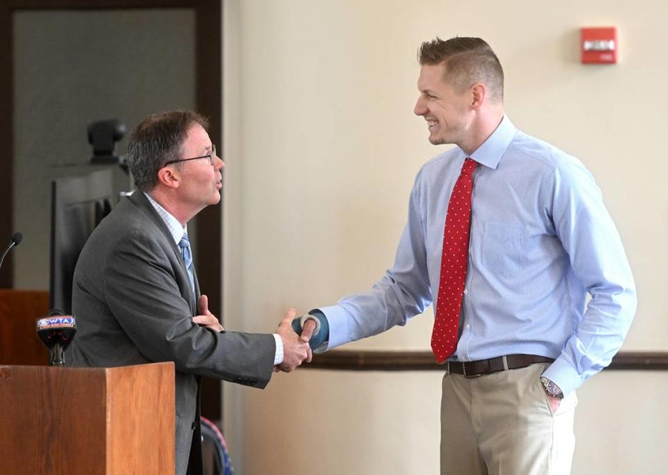 Chief John Petrick of the Ferguson Township Police Department congratulates Detective Caleb Clouse for being named one of the Law Enforcement Officers of the Year by the Centre County District Attorney’s Office on Thursday, July 13, 2023. Abby Drey/adrey@centredaily.com