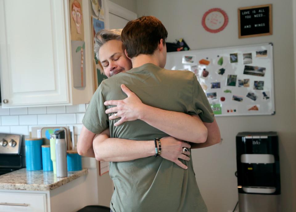 Branden Campbell hugs his son Connor Campbell, 16, at home in Provo on Sunday, May 28, 2023. Connor is autistic, nonverbal and has epilepsy. He lives at the Utah State Developmental Center in American Fork but comes home on Sundays. | Kristin Murphy, Deseret News