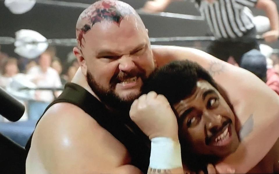 Memphis actor Patrick  Cox, as Crusher Yurkov (who later changed his wrestling name at Bam Bam Bigelow), puts a headlock on Joseph Lee Anderson as Rocky Johnson in the April 5 Memphis-set episode of "Young Rock."